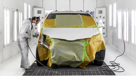 Collision Center Technician Painting a Vehicle | Mark McLarty Toyota in North Little Rock AR